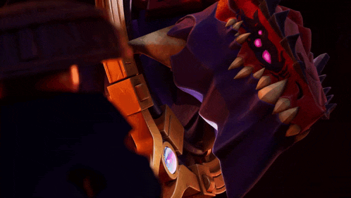 a close up of a purple and red monster with purple eyes