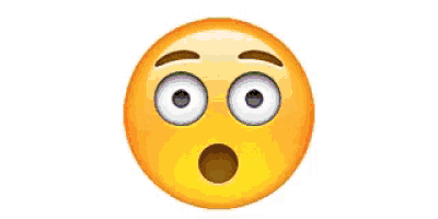 a rainbow is coming out of a smiley face 's mouth .