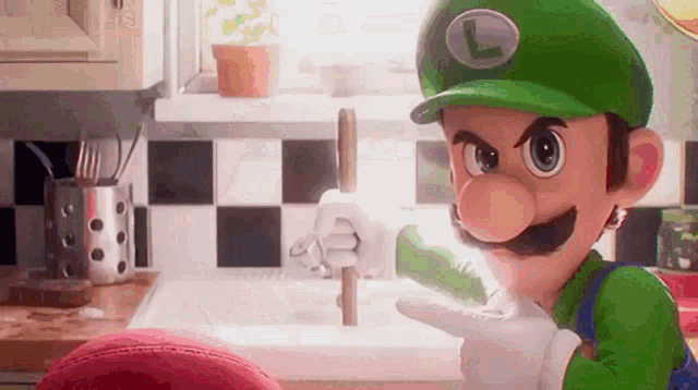 a cartoon character wearing a green hat and gloves is pointing at a sink .