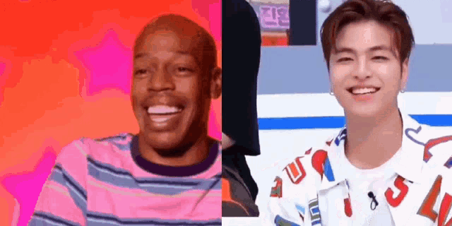 a black man and a white man are smiling and laughing .