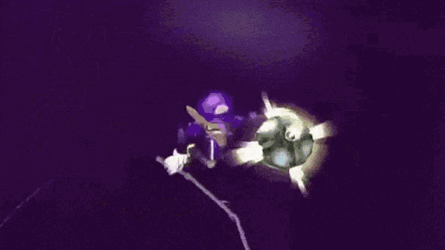 a person is standing in front of a purple background with a purple light coming out of their hands .