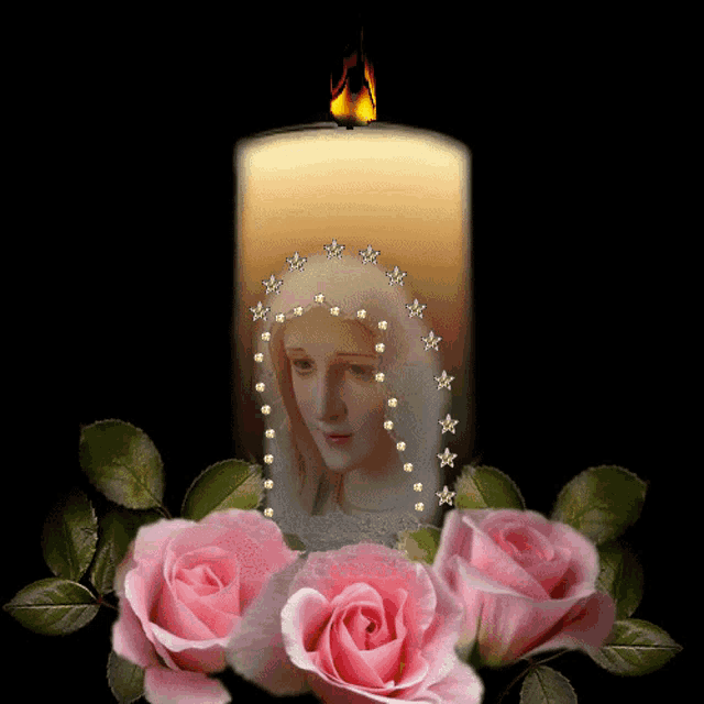 a candle with a picture of a woman and pink roses around it