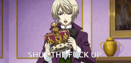 a man in a purple suit is holding a crown and the words shut the fuck up are below him