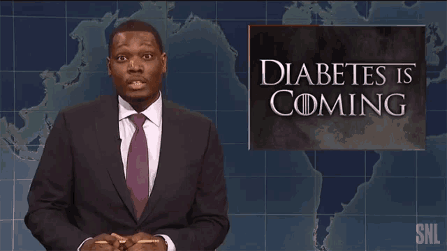 a man standing in front of a sign that says diabetes is coming
