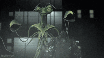 a black and white drawing of a green alien with a flower in its mouth