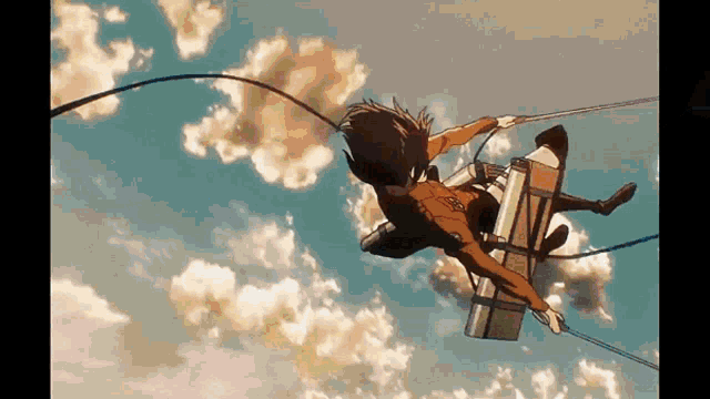 a person is flying through the air with a rope attached to them .