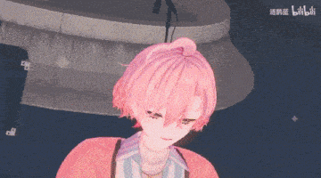 a girl with pink hair is sitting in front of a microphone .