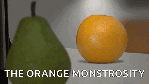 a pear and an orange with the words the orange monstrosity