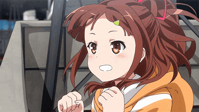a girl with brown hair is wearing a yellow and white shirt