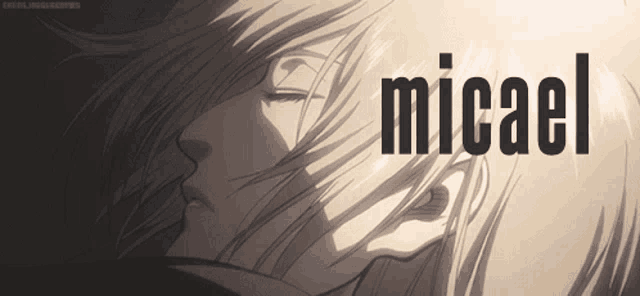 a close up of a person 's face with the name micael on the bottom