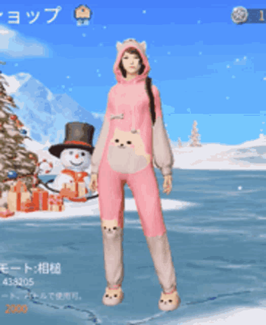 a girl in a pink bear onesie is standing in front of a snowman