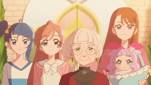 a group of anime girls standing next to each other