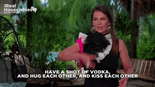 a woman says " have a shot of vodka " and " hug each other "