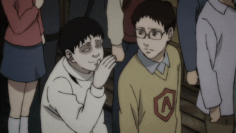 a boy with the letter a on his sweater
