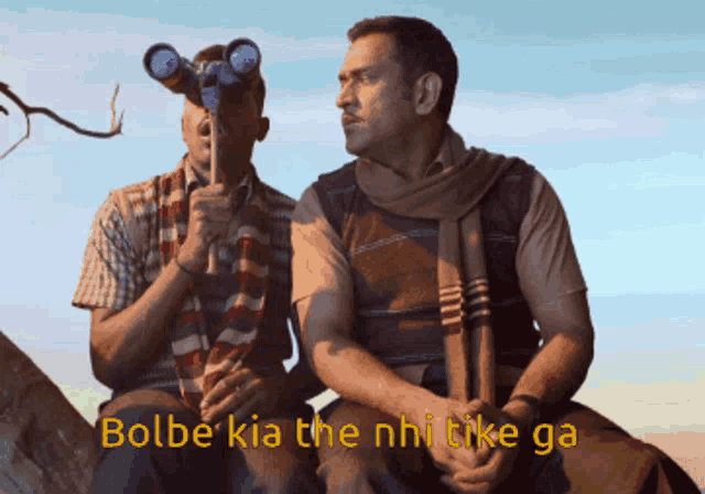 two men are sitting next to each other with bolbe kia the nhi tike ga written on the top
