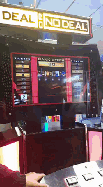 an arcade game called deal or no deal is being played