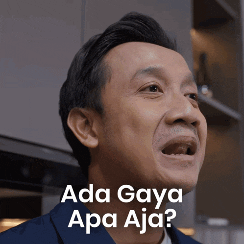 a man making a funny face with the words ada gaya apa aja