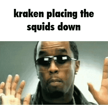 a man wearing sunglasses is making a funny face and says kraken placing the squids down