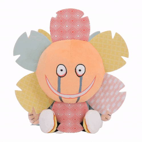 a stuffed animal with a green star on the back