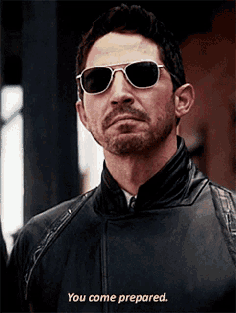 a man wearing sunglasses and a leather jacket says you come prepared