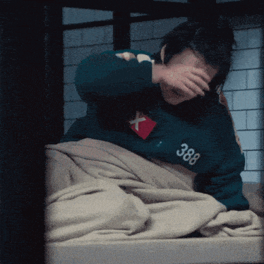 a person with the number 388 on their sweater