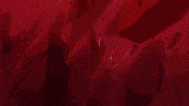 a close up of a person 's face with red eyes