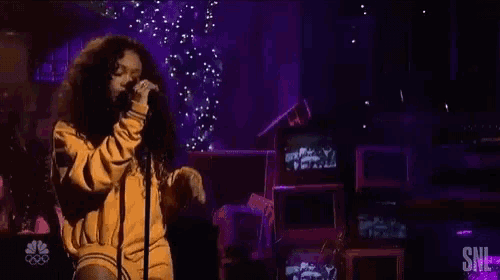 Singing Sza GIF