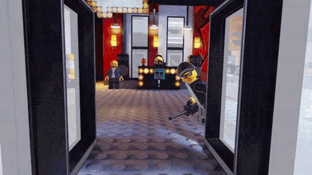 a lego character is holding a gun in a room with a sign that says ' a ' on it