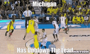 a basketball game between michigan and virginia