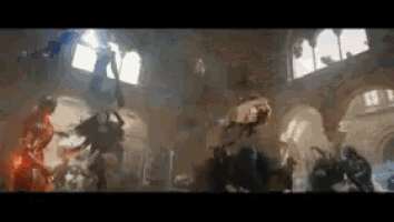 a group of people are dancing in a room with arched windows