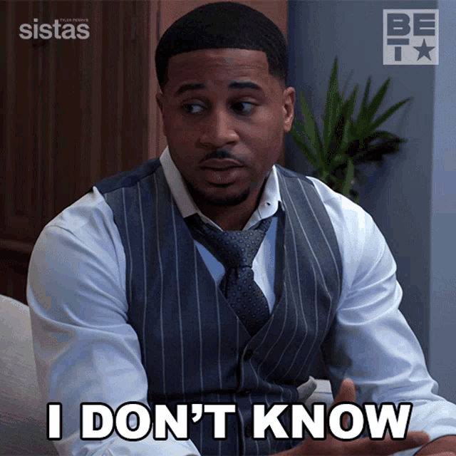 a man in a suit and tie is saying i don 't know