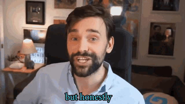 a man with a beard says but honestly in front of a camera