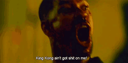 a man is screaming with his mouth open and the words `` king kong ain 't got shit on me ''