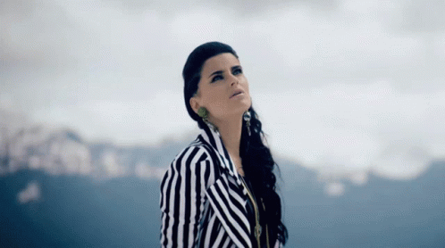 Looking Up Nelly Furtado GIF - Looking Up Nelly Furtado Spirit Indestructible Song GIFs