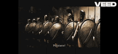 a row of spartan shields are lined up in a row and the word veed is on the bottom