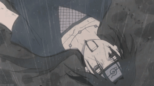 a person is laying on their back in the rain with a bandana on their head .