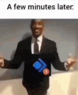 a man in a suit and tie is standing in front of a wall with his arms outstretched in a few minutes later .