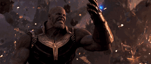 thanos from avengers infinity war is holding a sword