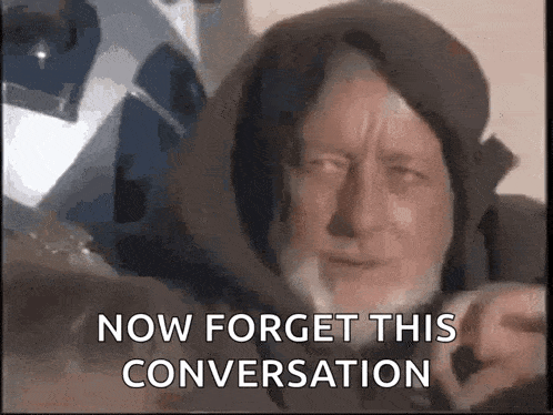 a man with a beard is wearing a hooded jacket and says now forget this conversation .