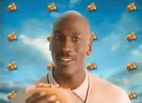 michael jordan is eating a hamburger in a mcdonald 's ad .
