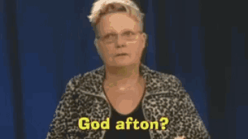 a woman with glasses and a leopard print jacket says god afton