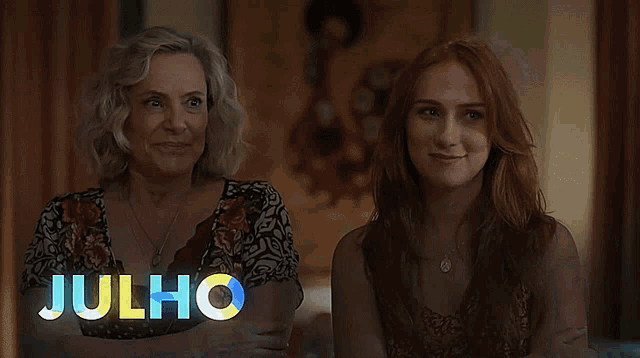 a woman is drinking from a glass with the words julho quanto mais vida melhor behind her