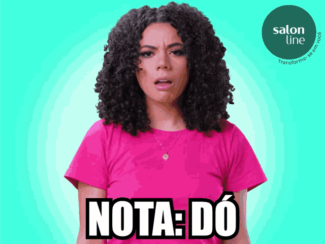 a woman wearing a pink shirt with the word nota do on it