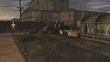 a blurry picture of a man standing in front of a building in a field .