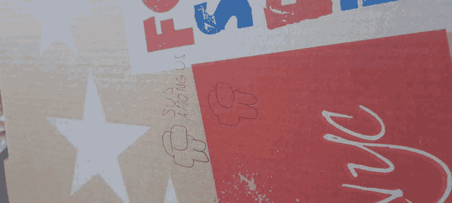 among us is written on a cardboard box