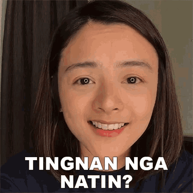 a woman is smiling with the words tingnan nga natin on the bottom