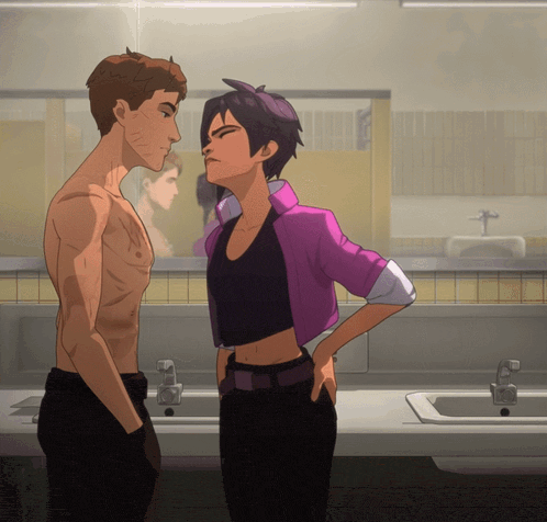 a man and a woman are standing in front of a bathroom sink
