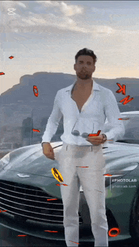 a man in a white shirt stands in front of a car