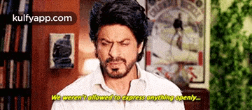 a man with a beard and a white shirt says we weren 't allowed to express anything openly .