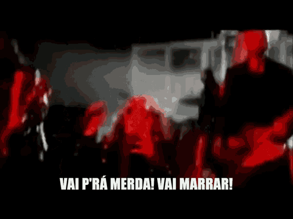 a group of people are standing in a dark room with the words vai pra merda vai marrar written on the bottom